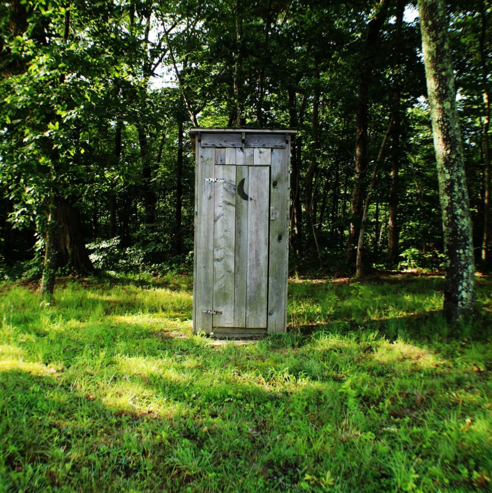 Outhouse that will not be used after On The Ball Plumbing toilet installation